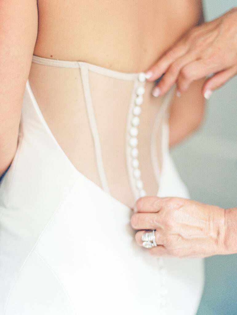 Chicago wedding - bride getting ready, wedding dress with buttons